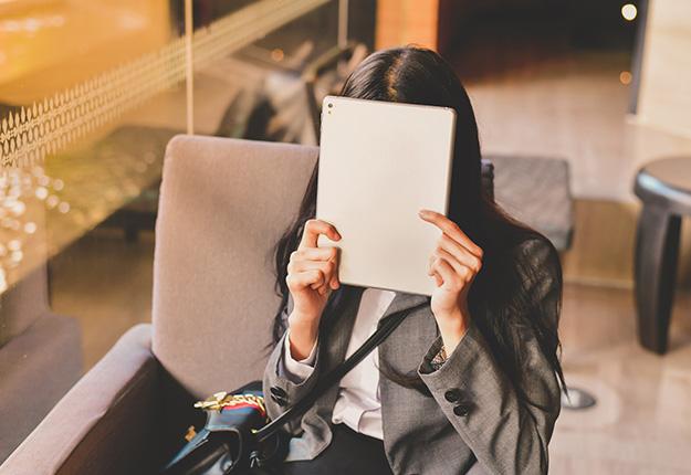 Businesswoman hidding her face