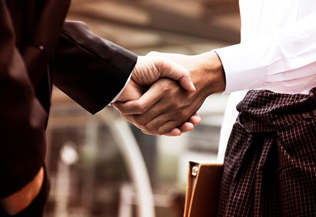 Business people shaking hands
