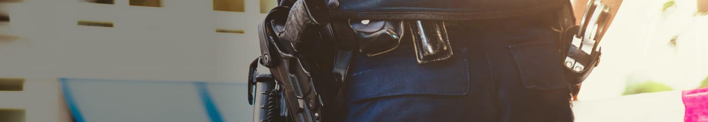 Closeup of a poloce officer's gun holster