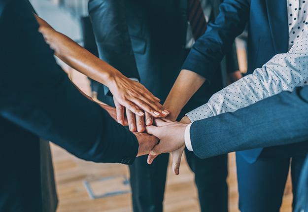 Teamwork hands together