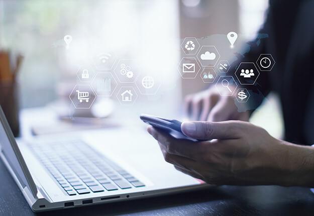 Businessman working with smartphone and laptop