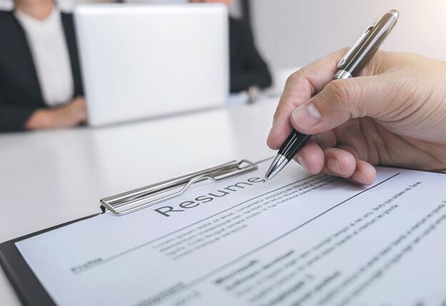 Person looking at a resume