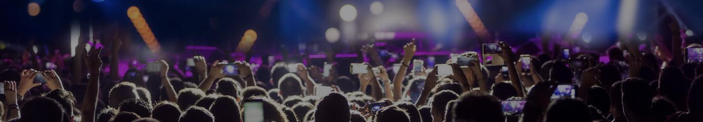 People cheering at a live concert